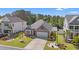 Charming home with attractive landscaping, a well-manicured lawn, and inviting curb appeal at 1087 Baker Creek Loop, Myrtle Beach, SC 29579