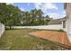 A charming backyard with a wooden deck, privacy fence, and grassy space at 1097 Stoney Falls Blvd., Myrtle Beach, SC 29579