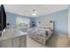 Cozy bedroom with natural light, ceiling fan, and storage options at 1097 Stoney Falls Blvd., Myrtle Beach, SC 29579