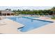 Community pool featuring ample shallow water, with various seating options, perfect for outdoor enjoyment and relaxation at 1097 Stoney Falls Blvd., Myrtle Beach, SC 29579