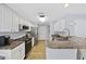 Well-equipped kitchen with stainless steel appliances, white cabinets, and spacious counter tops, perfect for cooking and entertaining at 1097 Stoney Falls Blvd., Myrtle Beach, SC 29579