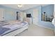 Comfortable main bedroom featuring a bed, soft carpet, dresser, and ample closet space, offering a relaxing retreat at 1097 Stoney Falls Blvd., Myrtle Beach, SC 29579