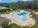 Aerial view of community pool with ample seating, shaded pergolas, and well-manicured landscaping at 1097 Stoney Falls Blvd., Myrtle Beach, SC 29579