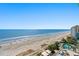 Aerial view of the beach, ocean, and pool at the Coral Beach Resort at 1105 South Ocean Blvd. # 806, Myrtle Beach, SC 29577