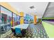 Vibrant arcade featuring colorful gaming machines and tiled flooring in a well-lit space at 1105 South Ocean Blvd. # 806, Myrtle Beach, SC 29577