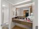 Bathroom featuring tile floors, granite counter vanity, large mirror, toilet and shower at 1105 South Ocean Blvd. # 806, Myrtle Beach, SC 29577