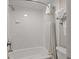 Bright bathroom features a tub and shower combination with white walls at 1105 South Ocean Blvd. # 806, Myrtle Beach, SC 29577