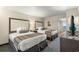 Bright bedroom with two double beds, stylish headboards, side table and furnishings at 1105 South Ocean Blvd. # 806, Myrtle Beach, SC 29577