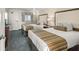 Comfortable bedroom featuring two double beds, TV, small table and patterned rug at 1105 South Ocean Blvd. # 806, Myrtle Beach, SC 29577