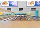 Interior shot of a bowling alley featuring wooden lanes, digital scoring, and a contemporary design at 1105 South Ocean Blvd. # 806, Myrtle Beach, SC 29577