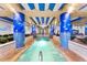 Indoor hot tub area with blue columns, tile, and water feature at 1105 South Ocean Blvd. # 806, Myrtle Beach, SC 29577