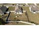 Overhead view of the property highlighting its expansive fenced backyard, patio, and serene surroundings at 112 Rialto Dr., Conway, SC 29526