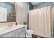Stylish bathroom with a vanity sink, bathtub and neutral shower curtain at 112 Rialto Dr., Conway, SC 29526