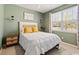 Cozy bedroom featuring a comfortable bed, neutral decor, and a bright window at 112 Rialto Dr., Conway, SC 29526
