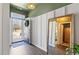 Inviting foyer featuring an open door, wooden floors and stylish mirror at 112 Rialto Dr., Conway, SC 29526