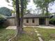 Backyard view with a small shed and a concrete patio at 116 Hickory Dr., Conway, SC 29526