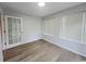 Bright bedroom with natural light and hardwood flooring at 116 Hickory Dr., Conway, SC 29526