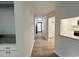 Hallway view of the front door and kitchen at 116 Hickory Dr., Conway, SC 29526