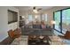 Cozy living room with modern furnishings and view of the dining area at 116 Hickory Dr., Conway, SC 29526