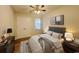 Cozy main bedroom featuring a comfortable bed, stylish lamps, and elegant decor for a relaxing retreat at 116 Hickory Dr., Conway, SC 29526