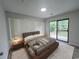 Inviting primary bedroom with sliding glass door and cozy decor at 116 Hickory Dr., Conway, SC 29526