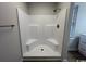 Bathroom featuring a walk-in shower and a window at 116 Hickory Dr., Conway, SC 29526