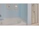 Bright bathroom showcasing a corner tub and a glass-enclosed shower, perfect for relaxation and convenience at 1250 Camlet Ln., Little River, SC 29566