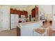 Well-equipped kitchen with stainless steel appliances and hardwood flooring overlooking the dining area at 1250 Camlet Ln., Little River, SC 29566