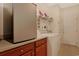 Functional laundry room with washer, dryer, storage cabinets, countertop, and shelving space at 1250 Camlet Ln., Little River, SC 29566