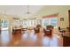 Spacious living room with vaulted ceiling, hardwood flooring and lots of natural light from surrounding windows at 1250 Camlet Ln., Little River, SC 29566
