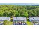This aerial view of the property highlights its convenient parking and proximity to a wooded area at 1260 White Tree Ln. # F, Myrtle Beach, SC 29588