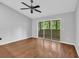 Spacious, bright bedroom with a sliding glass door, hardwood flooring, and neutral paint at 1260 White Tree Ln. # F, Myrtle Beach, SC 29588