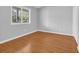 Bedroom featuring hardwood floors, neutral paint, and closet at 1260 White Tree Ln. # F, Myrtle Beach, SC 29588