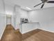 Bright open-concept kitchen featuring stainless steel appliances, light cabinets and an adjacent dining area at 1260 White Tree Ln. # F, Myrtle Beach, SC 29588