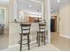 View of breakfast bar that connects to the kitchen and dining area at 127 Willow Bay Dr., Murrells Inlet, SC 29576