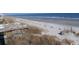 View of the beach with dunes and the ocean in the background at 127 Willow Bay Dr., Murrells Inlet, SC 29576