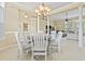 Dining room featuring an elegant chandelier and views of the living room at 127 Willow Bay Dr., Murrells Inlet, SC 29576