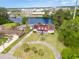 Beautiful home on the water with solar panels, a backyard pool, and a well-manicured lawn at 128 Causey St., Myrtle Beach, SC 29577