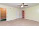 Bedroom features neutral carpet, neutral paint, and two doors to other rooms at 128 Causey St., Myrtle Beach, SC 29577