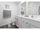 Clean bathroom with dual sinks, modern fixtures, and a neutral color scheme at 136 Villa Grande St. # B, Myrtle Beach, SC 29579