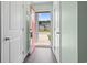 View from entryway showing an open doorway and natural light and access to other rooms at 136 Villa Grande St. # B, Myrtle Beach, SC 29579