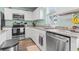Well-appointed kitchen with stainless steel appliances, modern fixtures, and plenty of counter space at 136 Villa Grande St. # B, Myrtle Beach, SC 29579