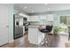 Bright kitchen with stainless steel appliances, a granite countertop island and breakfast bar at 136 Villa Grande St. # B, Myrtle Beach, SC 29579