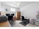 Bright home office with two desks, multiple monitors, and closet storage space at 136 Villa Grande St. # B, Myrtle Beach, SC 29579