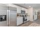 Well-equipped kitchen featuring stainless steel appliances, granite countertops, and white cabinetry at 152 Ashworth Dr., Tabor City, NC 28463