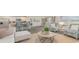 Inviting living room with striped chairs, a modern coffee table, and an open floor plan at 152 Ashworth Dr., Tabor City, NC 28463