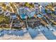 Aerial view of condo complex on ocean with pool and beach access boardwalks at 1581 S Waccamaw Dr. # 302, Garden City Beach, SC 29576