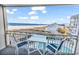 Balcony overlooking pool and ocean with seating at 1581 S Waccamaw Dr. # 302, Garden City Beach, SC 29576
