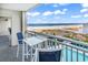 Balcony overlooking pool and ocean with seating at 1581 S Waccamaw Dr. # 302, Garden City Beach, SC 29576