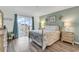 Beautiful bedroom with balcony access at 1581 S Waccamaw Dr. # 302, Garden City Beach, SC 29576